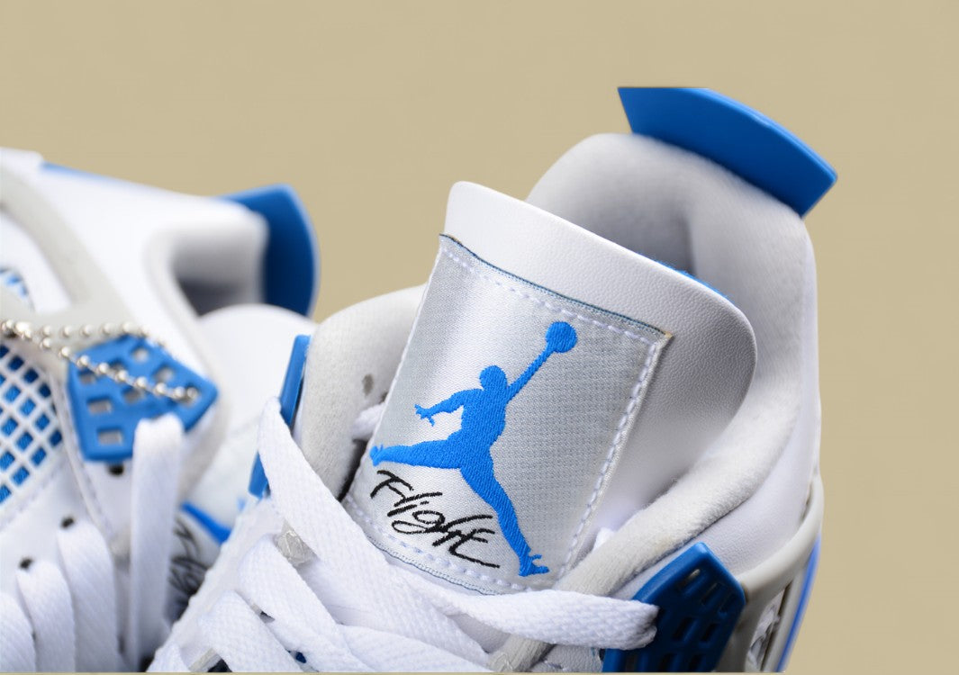 Air Jordan 4 Retro in White, Blue, and Grey