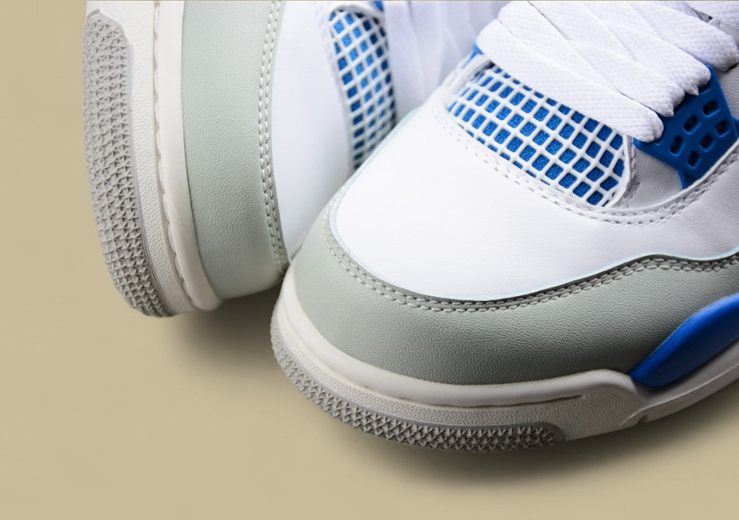 Air Jordan 4 Retro in White, Blue, and Grey