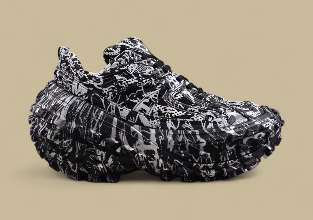 Balenciaga Defender Sneaker – Black & White Graffiti Print