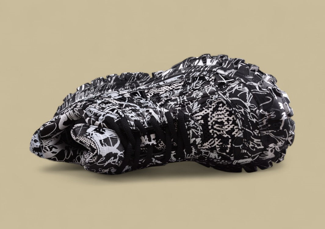 Balenciaga Defender Sneaker – Black & White Graffiti Print