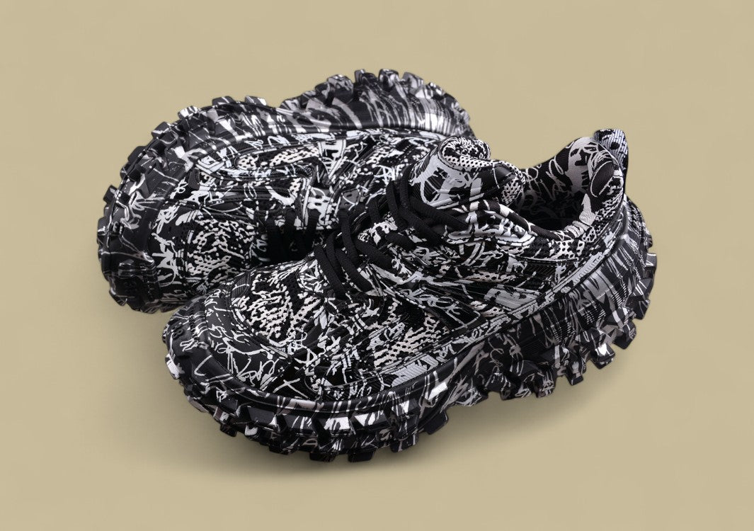 Balenciaga Defender Sneaker – Black & White Graffiti Print