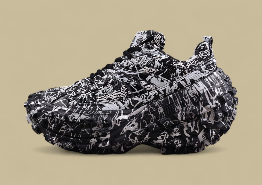 Balenciaga Defender Sneaker – Black & White Graffiti Print
