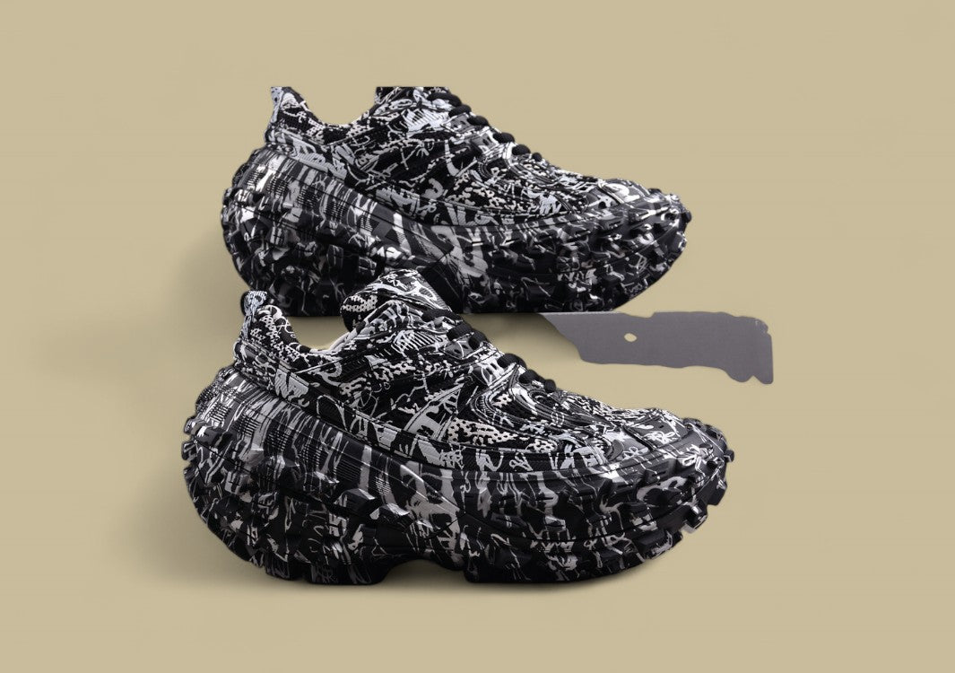 Balenciaga Defender Sneaker – Black & White Graffiti Print
