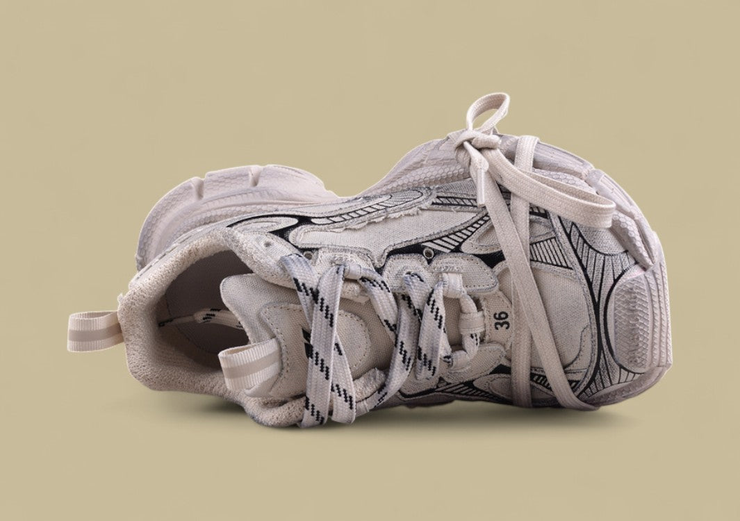 Balenciaga Defender Sneaker – Distressed Beige/Black