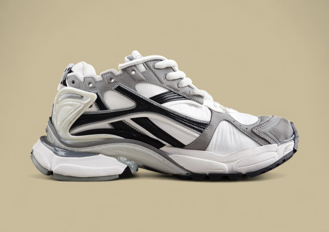 Balenciaga Runner Sneaker in a white, grey, and black