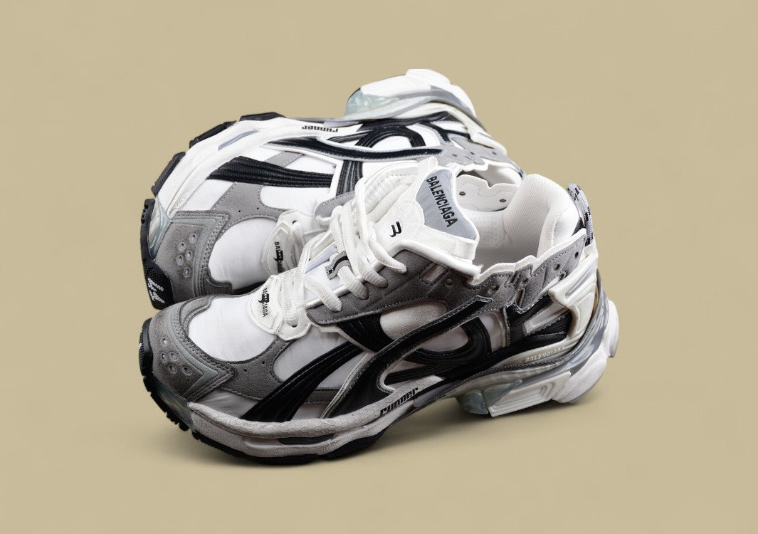 Balenciaga Runner Sneaker in a white, grey, and black