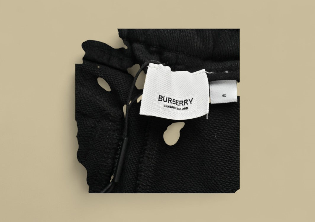 Burberry Knight Warhorse Logo Hollow-Out Plaid Patch Shorts – Black