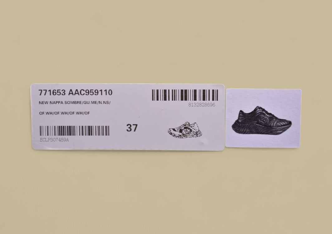 Gucci Black Sculpted Sneakers Futuristic Leather Runners with Monochrome GG Design