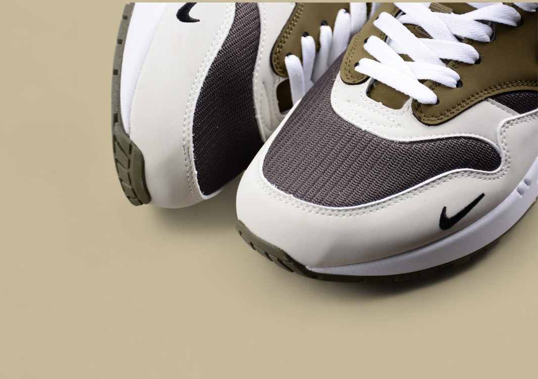 Nike Air Max 1 Sleek Retro Sneakers with Cushioning Tech