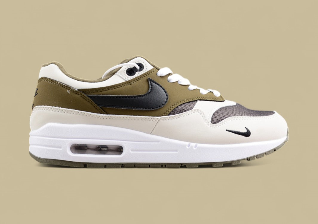 Nike Air Max 1 Sleek Retro Sneakers with Cushioning Tech