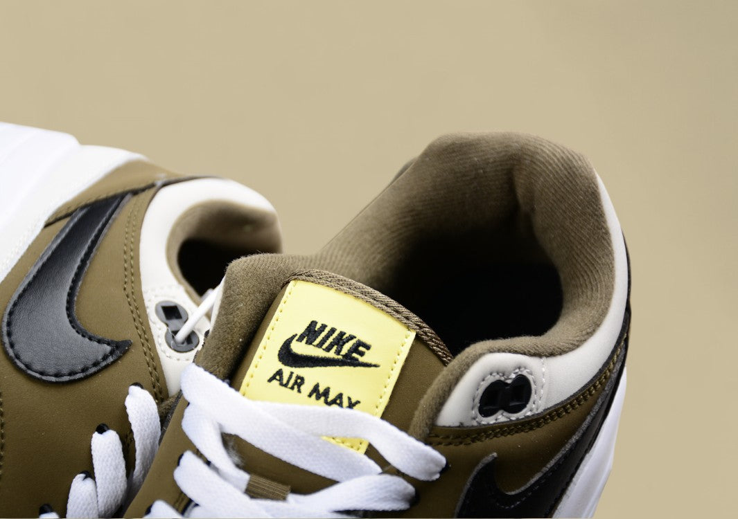 Nike Air Max 1 Sleek Retro Sneakers with Cushioning Tech
