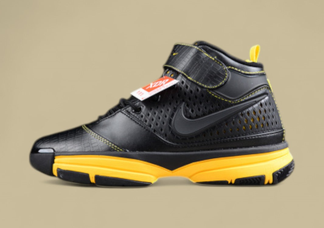 Nike Kobe Black Yellow Basketball Shoes Mid-top Build With Bold Contrast and Perforated Upper
