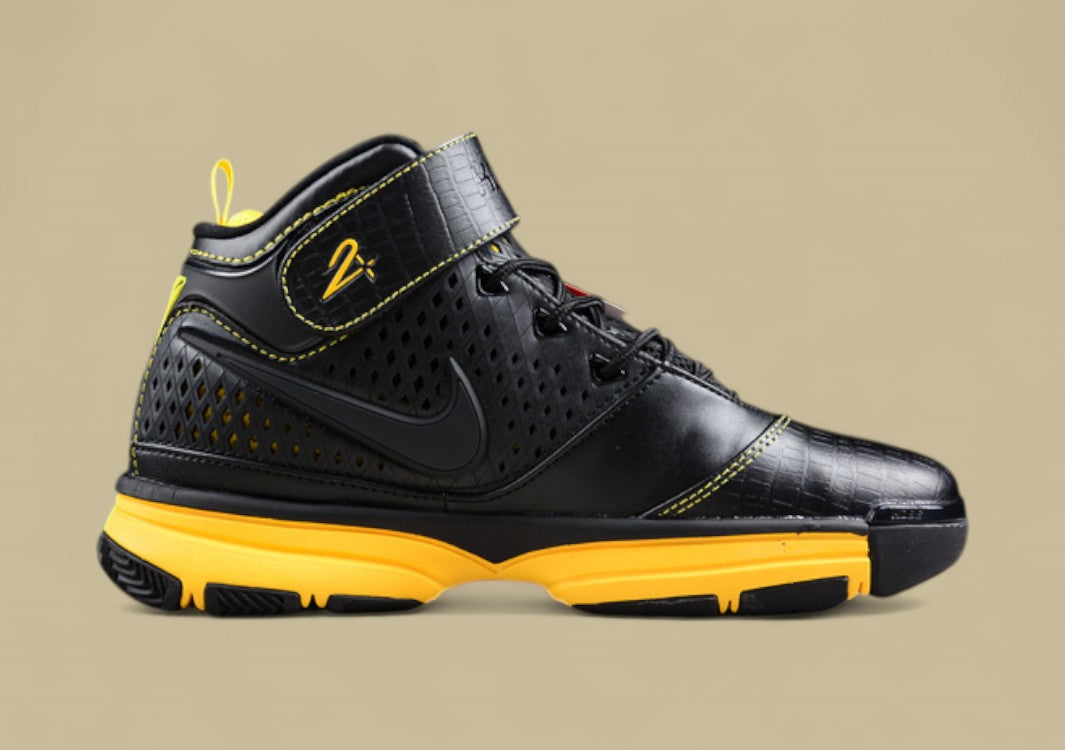 Nike Kobe Black Yellow Basketball Shoes Mid-top Build With Bold Contrast and Perforated Upper