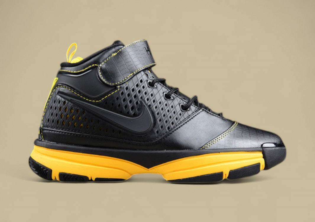 Nike Kobe Black Yellow Basketball Shoes Mid-top Build With Bold Contrast and Perforated Upper