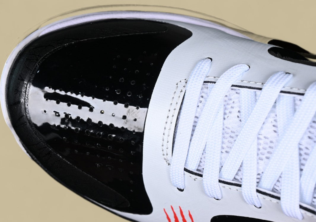 Nike Kobe ChNike Kobe Chaos White Black Gold Red Sleek Low-top Design With Glossy Panels and Bold Accentsaos Black gold Bold Yellow and Black Colorway With Red Details and Low-top Build (Copy)
