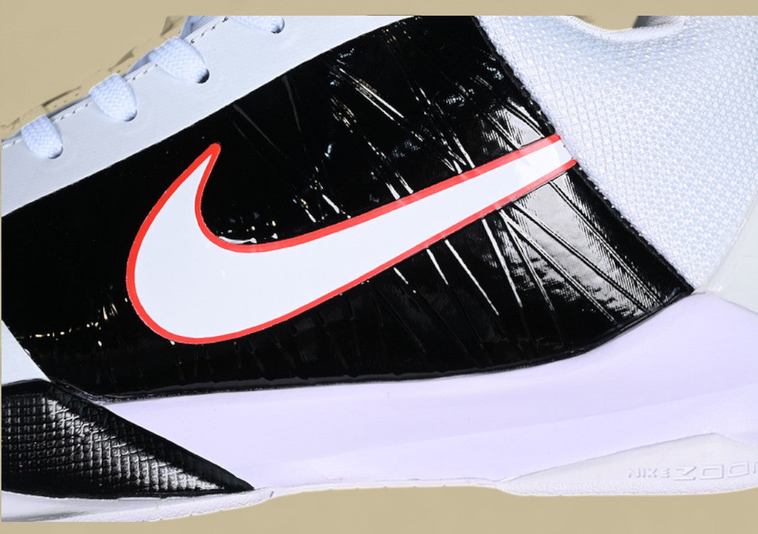 Nike Kobe ChNike Kobe Chaos White Black Gold Red Sleek Low-top Design With Glossy Panels and Bold Accentsaos Black gold Bold Yellow and Black Colorway With Red Details and Low-top Build (Copy)