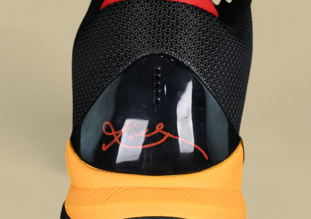 Nike Kobe Chaos Black gold Bold Yellow and Black Colorway With Red Details and Low-top Build