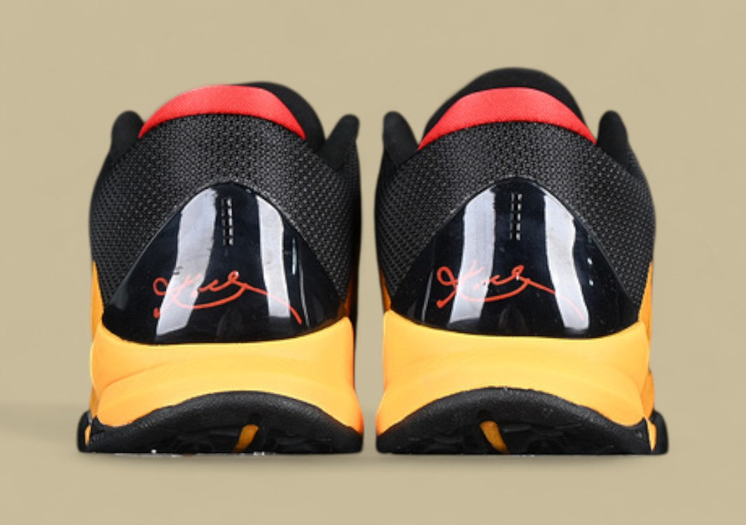 Nike Kobe Chaos Black gold Bold Yellow and Black Colorway With Red Details and Low-top Build