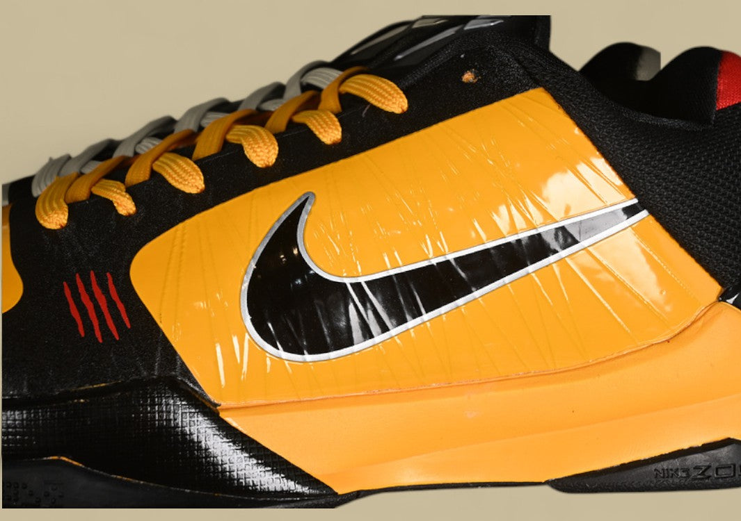 Nike Kobe "Del Sol Comet Red Black" Striking Low-Top Basketball Shoe with Lakers-Inspired Vibes
