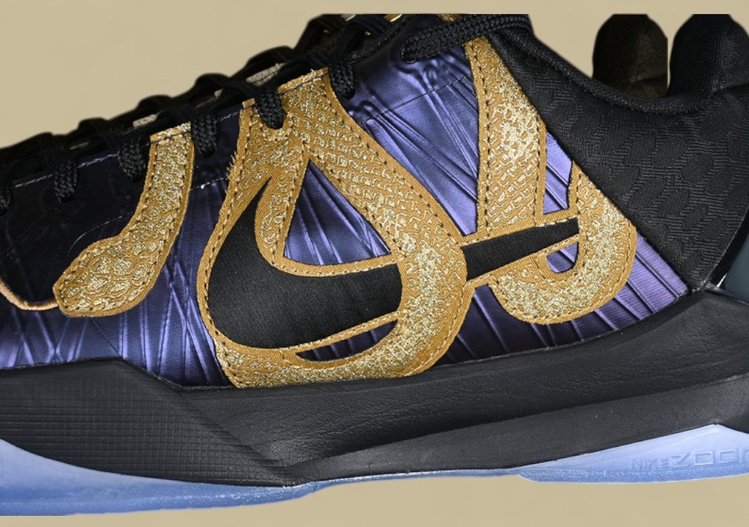 Nike Kobe "Eggplant" Purple Black Basketball Shoe with Gold Swoosh Detail