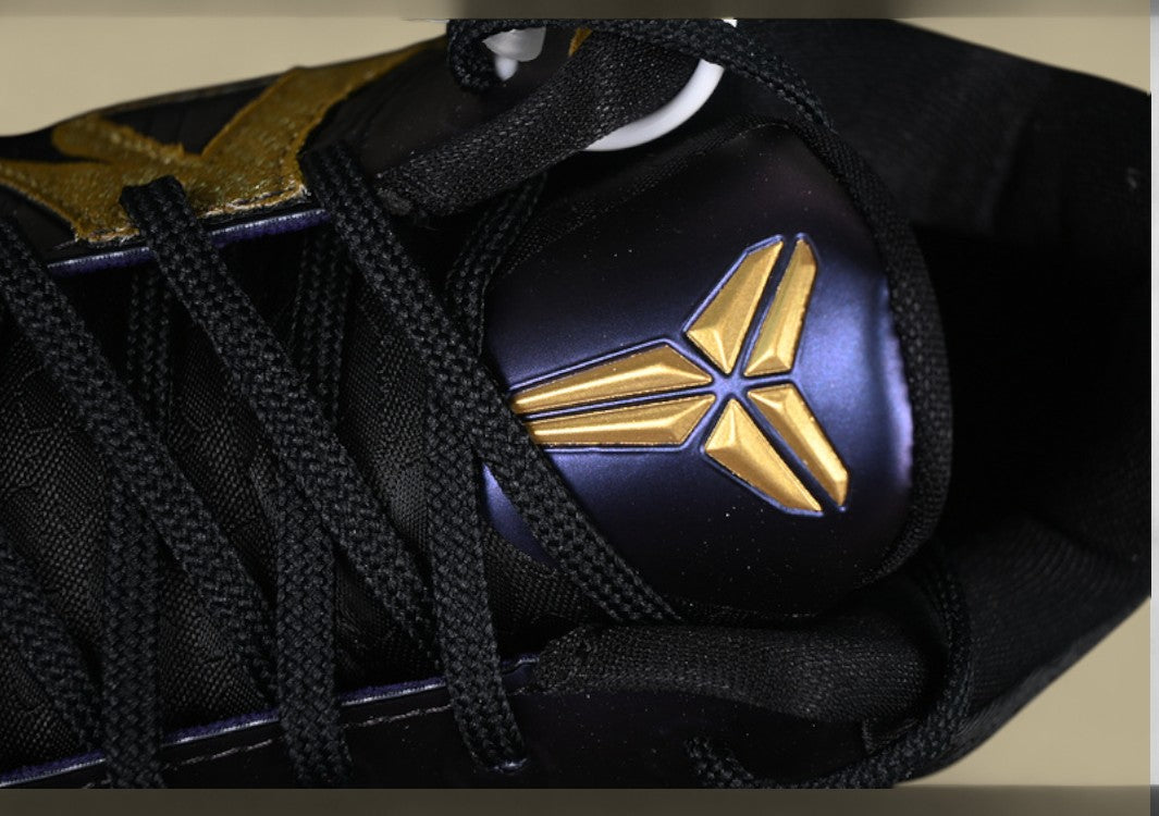 Nike Kobe "Eggplant" Purple Black Basketball Shoe with Gold Swoosh Detail