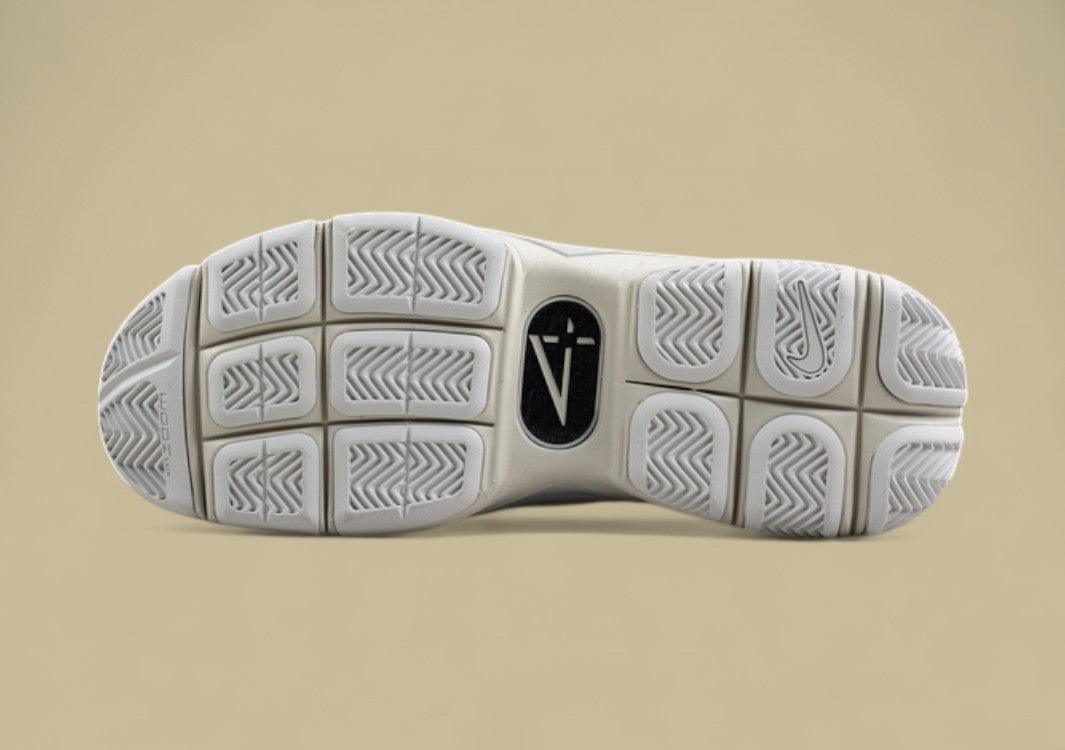 Nike Kobe "Light Bone" Minimalist Monochrome Mid-Top Basketball Shoe