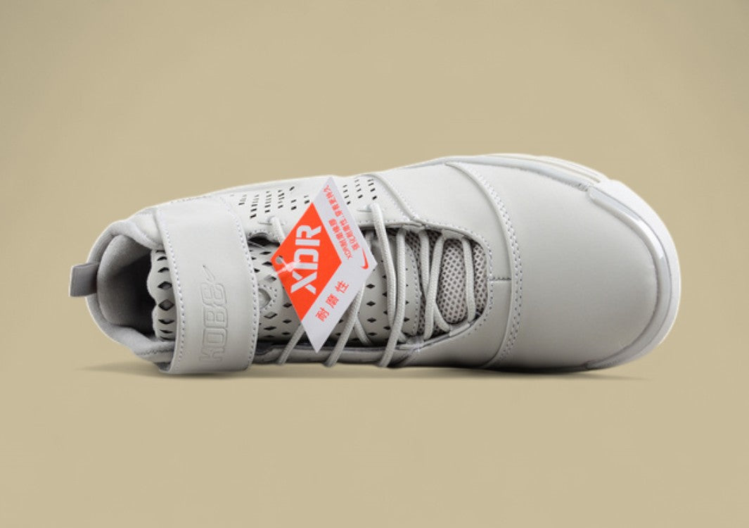 Nike Kobe "Light Bone" Minimalist Monochrome Mid-Top Basketball Shoe
