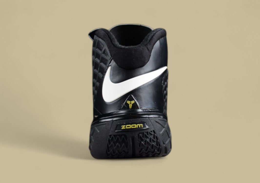 Nike Kobe Orca Black White Anthracite Varsity Maize All-black Cage Design With Bold Accents