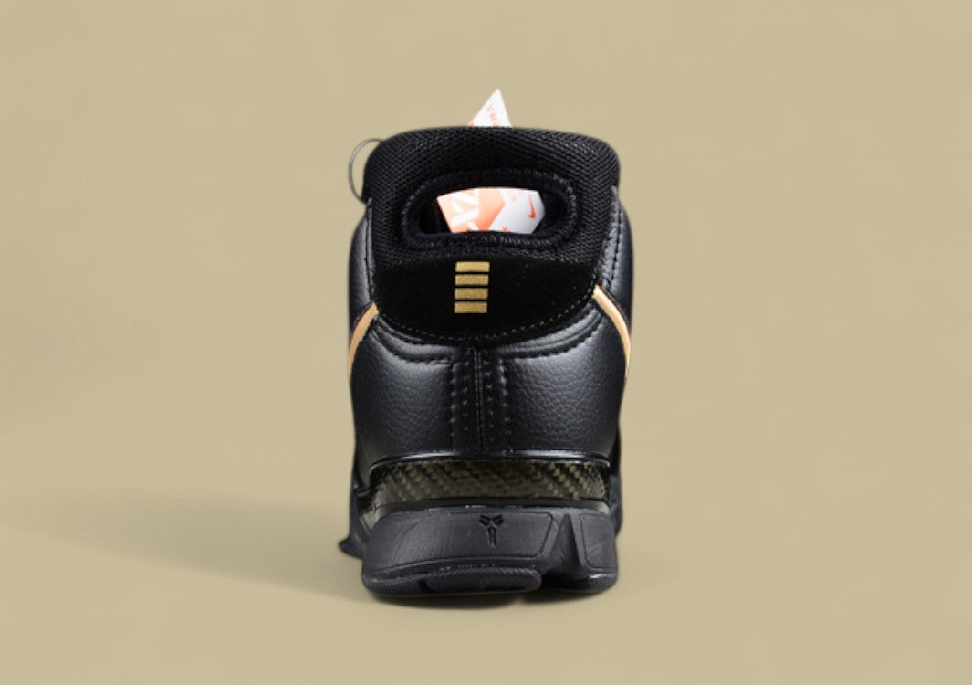Nike Kobe Protro Black Gold Classic Mid-top Basketball Shoe With Bold Metallic Swoosh Accent