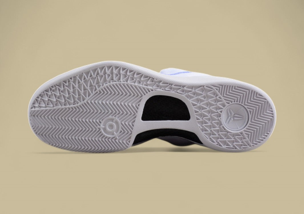 Nike Kobe Protro Triple White Sleek All-white Low-top Basketball Shoe With Minimalist Design