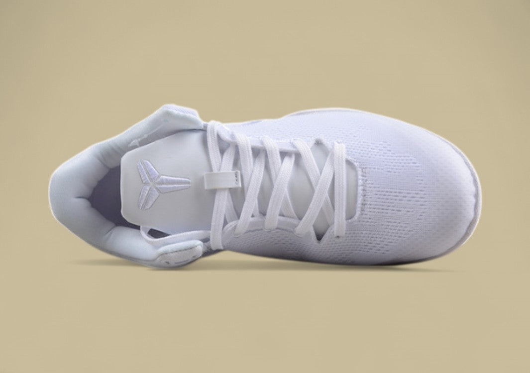 Nike Kobe Protro Triple White Sleek All-white Low-top Basketball Shoe With Minimalist Design