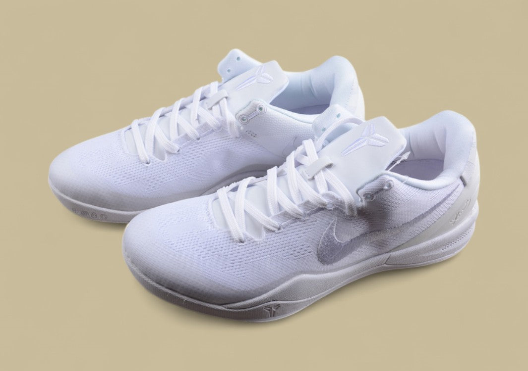 Nike Kobe Protro Triple White Sleek All-white Low-top Basketball Shoe With Minimalist Design