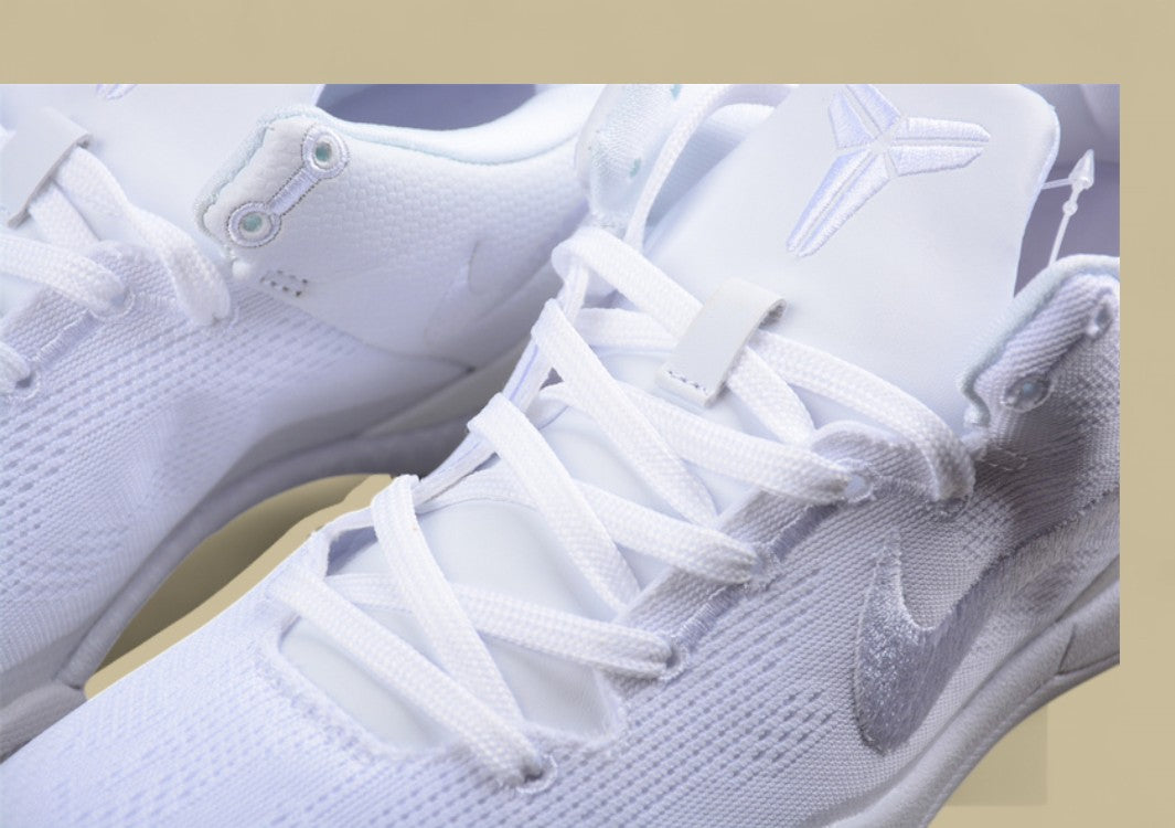 Nike Kobe Protro Triple White Sleek All-white Low-top Basketball Shoe With Minimalist Design