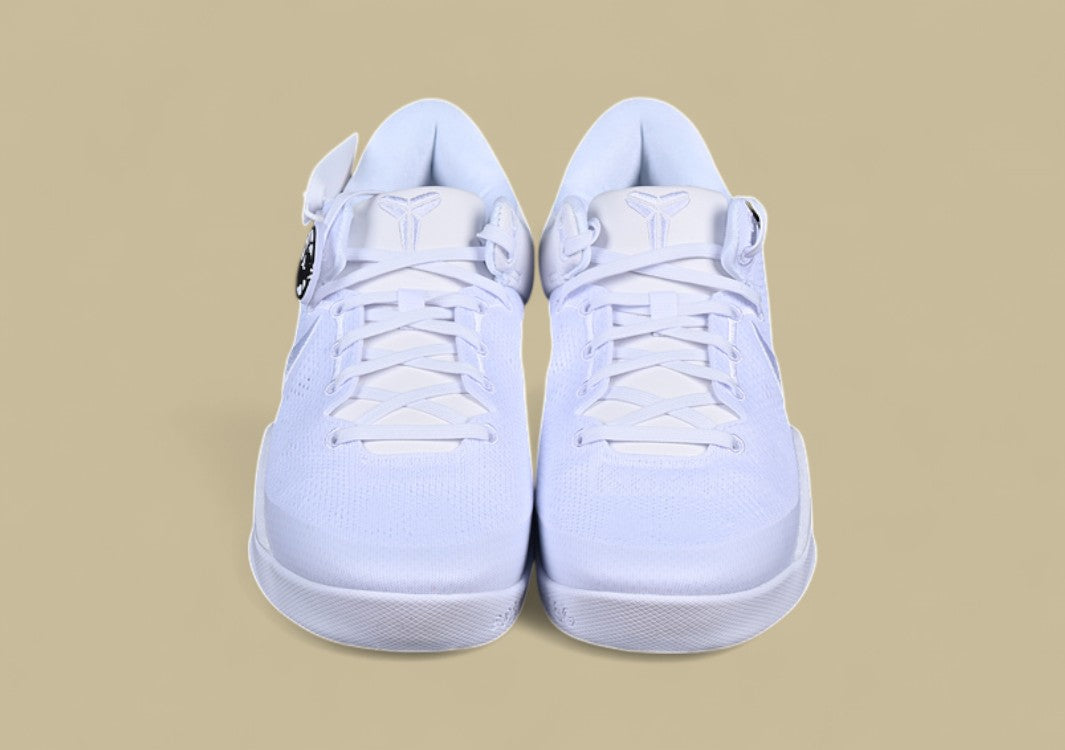 Nike Kobe System White Clean Triple-white Low-top Basketball Shoe With Sleek Minimalist Design