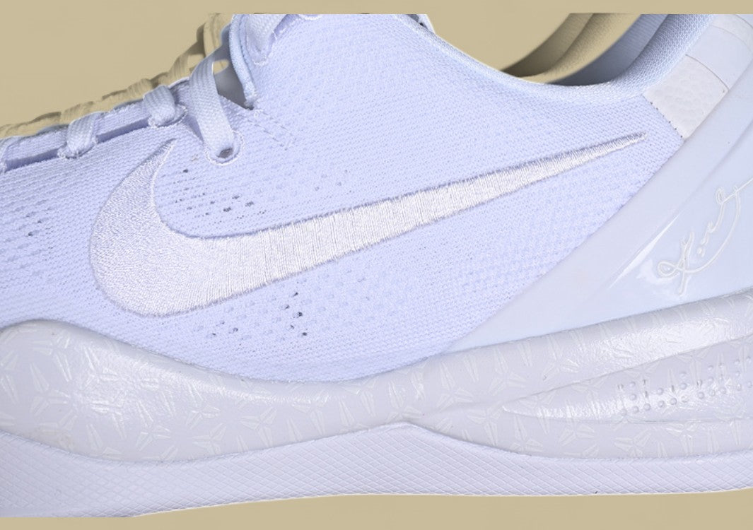 Nike Kobe System White Clean Triple-white Low-top Basketball Shoe With Sleek Minimalist Design