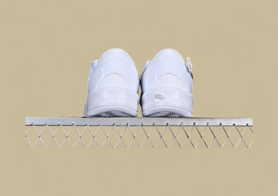 Nike Kobe System White Clean Triple-white Low-top Basketball Shoe With Sleek Minimalist Design