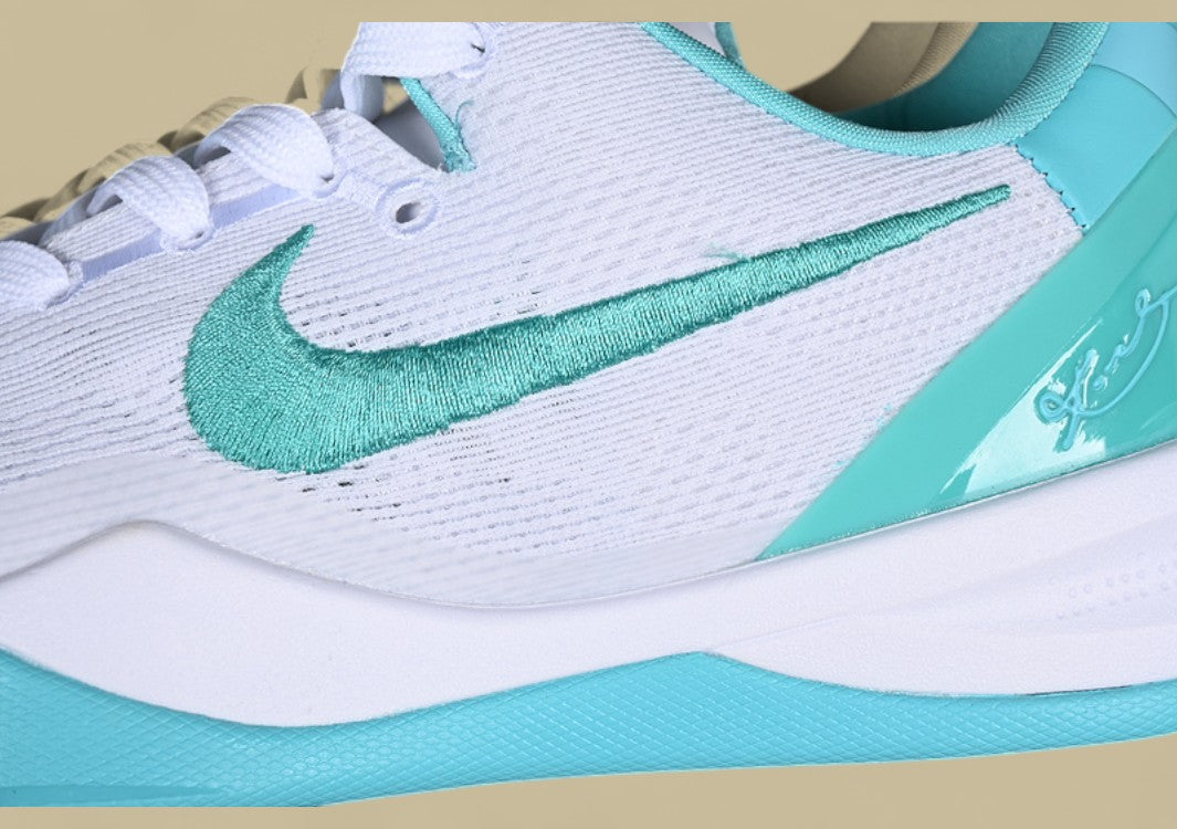 Nike Kobe System White green Fresh Aqua Accents on Sleek Low-top Performance Basketball Shoe
