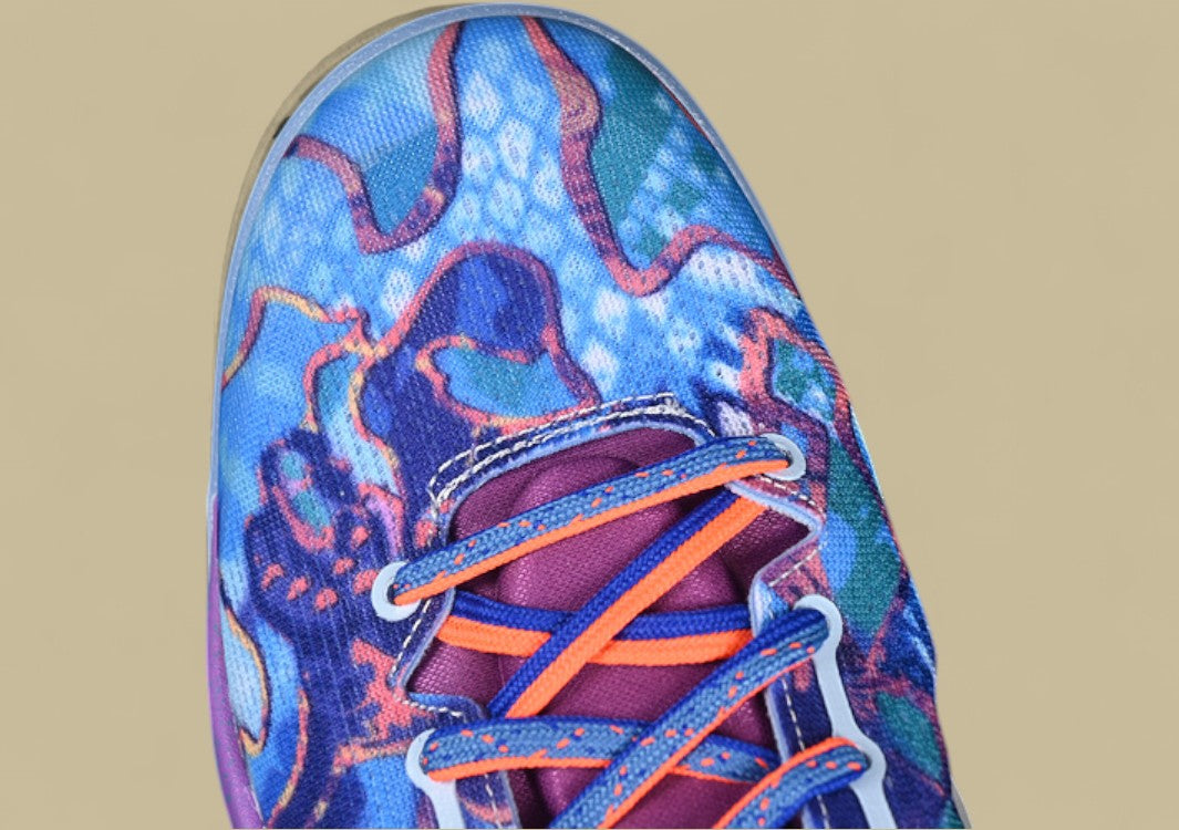 Nike Kobe "What The" Multi-Color Mashup Basketball Shoe with Bold Graphic Detailing