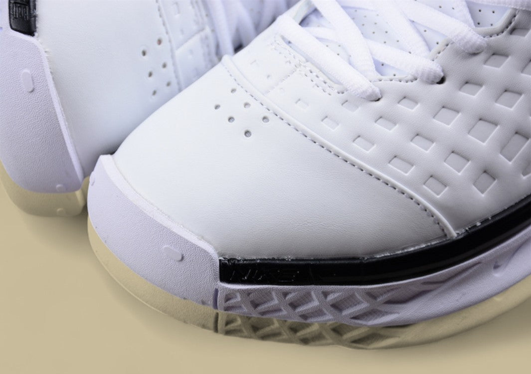 Nike Kobe White Black Clean Mid-top Basketball Shoe With Grid Upper and Bold Contrast Swoosh