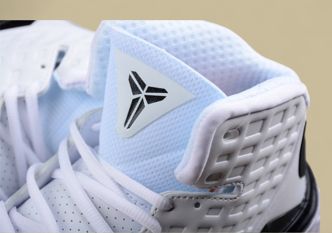 Nike Kobe White Black Clean Mid-top Basketball Shoe With Grid Upper and Bold Contrast Swoosh