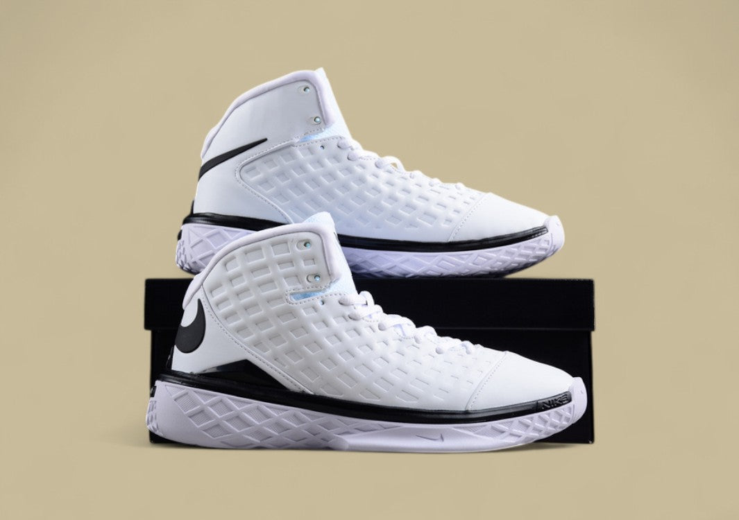 Nike Kobe White Black Clean Mid-top Basketball Shoe With Grid Upper and Bold Contrast Swoosh