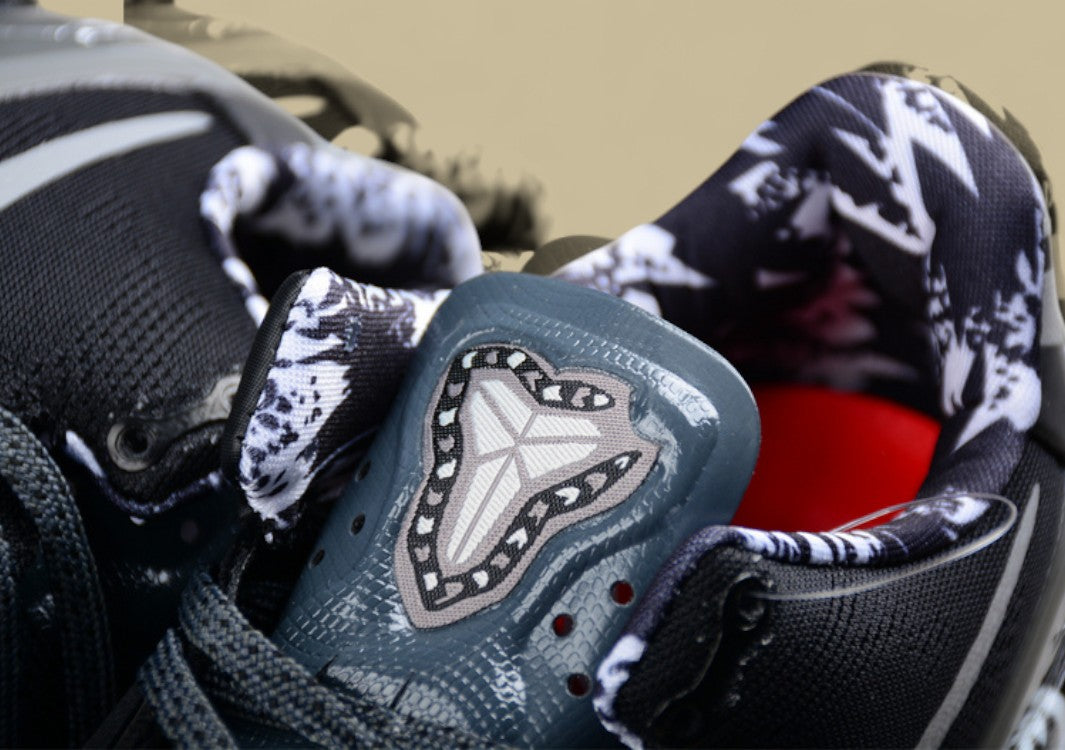 Nike Kobe White Grey Black Low-top Basketball Shoes With Graphic Midsole Detailing