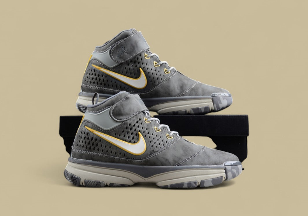 Nike Kobe White Grey Yellow Mid-top Basketball Shoes With Perforated Panels and Camo Outsole