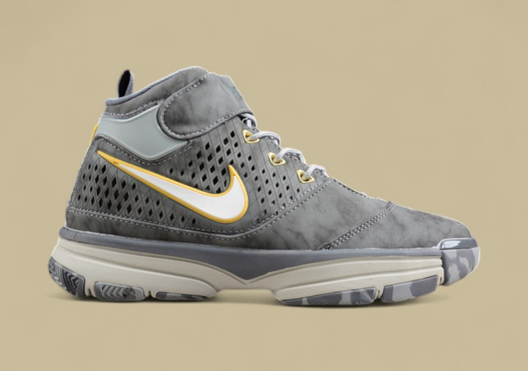 Nike Kobe White Grey Yellow Mid-top Basketball Shoes With Perforated Panels and Camo Outsole