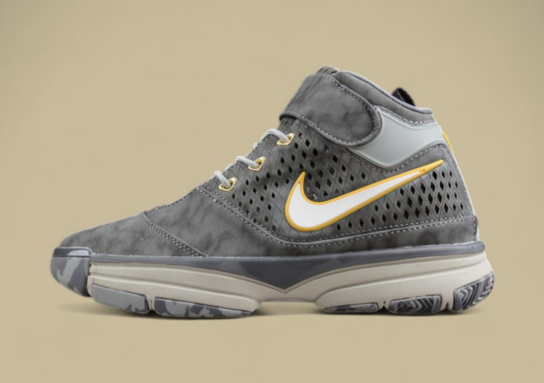 Nike Kobe White Grey Yellow Mid-top Basketball Shoes With Perforated Panels and Camo Outsole
