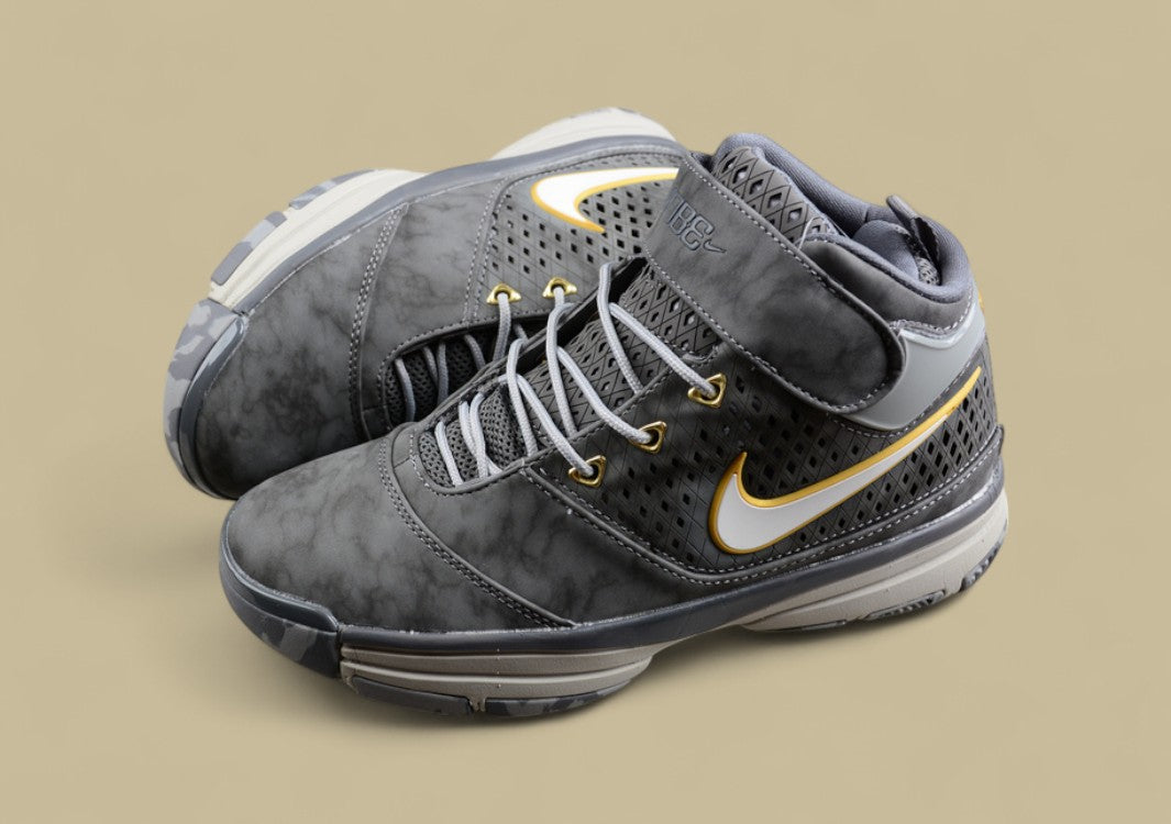 Nike Kobe White Grey Yellow Mid-top Basketball Shoes With Perforated Panels and Camo Outsole