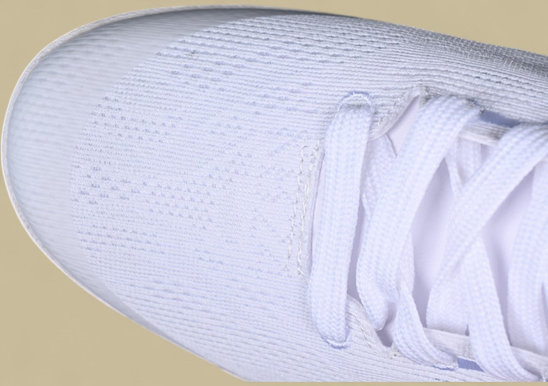 Nike Kobe White Triple White Low-top Basketball Shoe With Mesh Upper and Sleek Finish