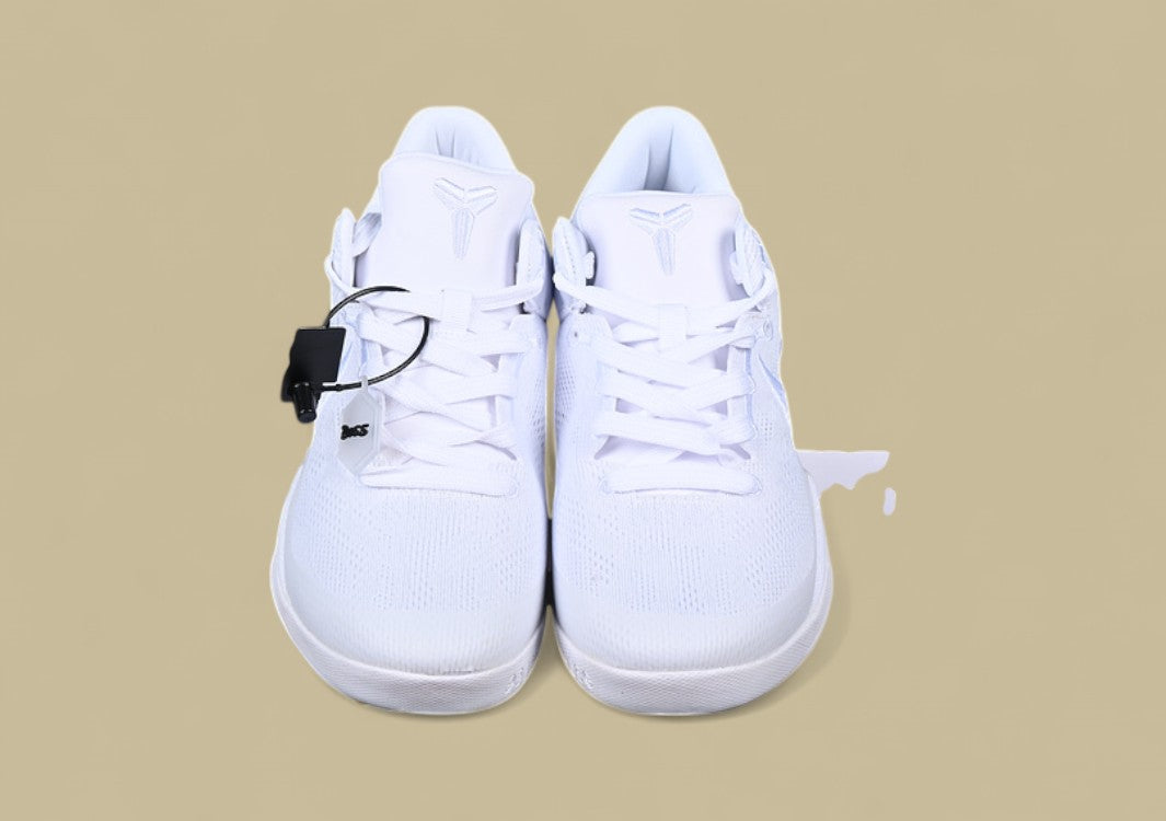 Nike Kobe White Triple White Low-top Basketball Shoe With Mesh Upper and Sleek Finish