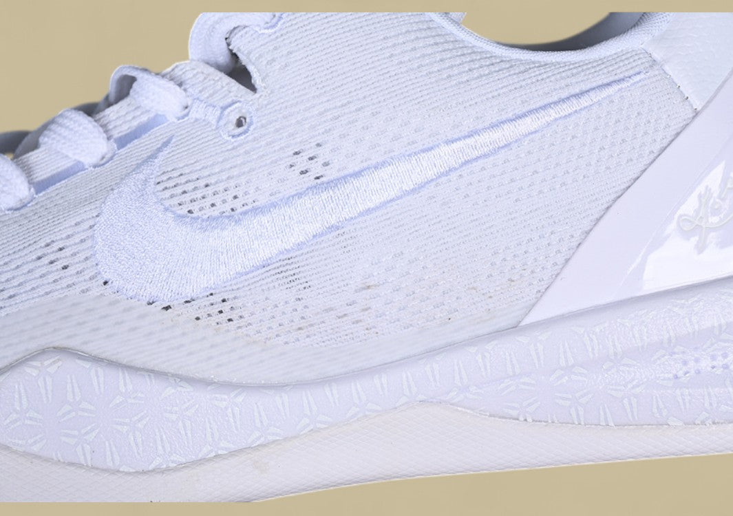 Nike Kobe White Triple White Low-top Basketball Shoe With Mesh Upper and Sleek Finish