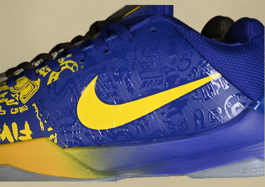Nike Zoom Kobe "Concord Midwest Gold" Bold Graphic Low-Top Basketball Shoe with Vibrant Blue and Yellow Accents